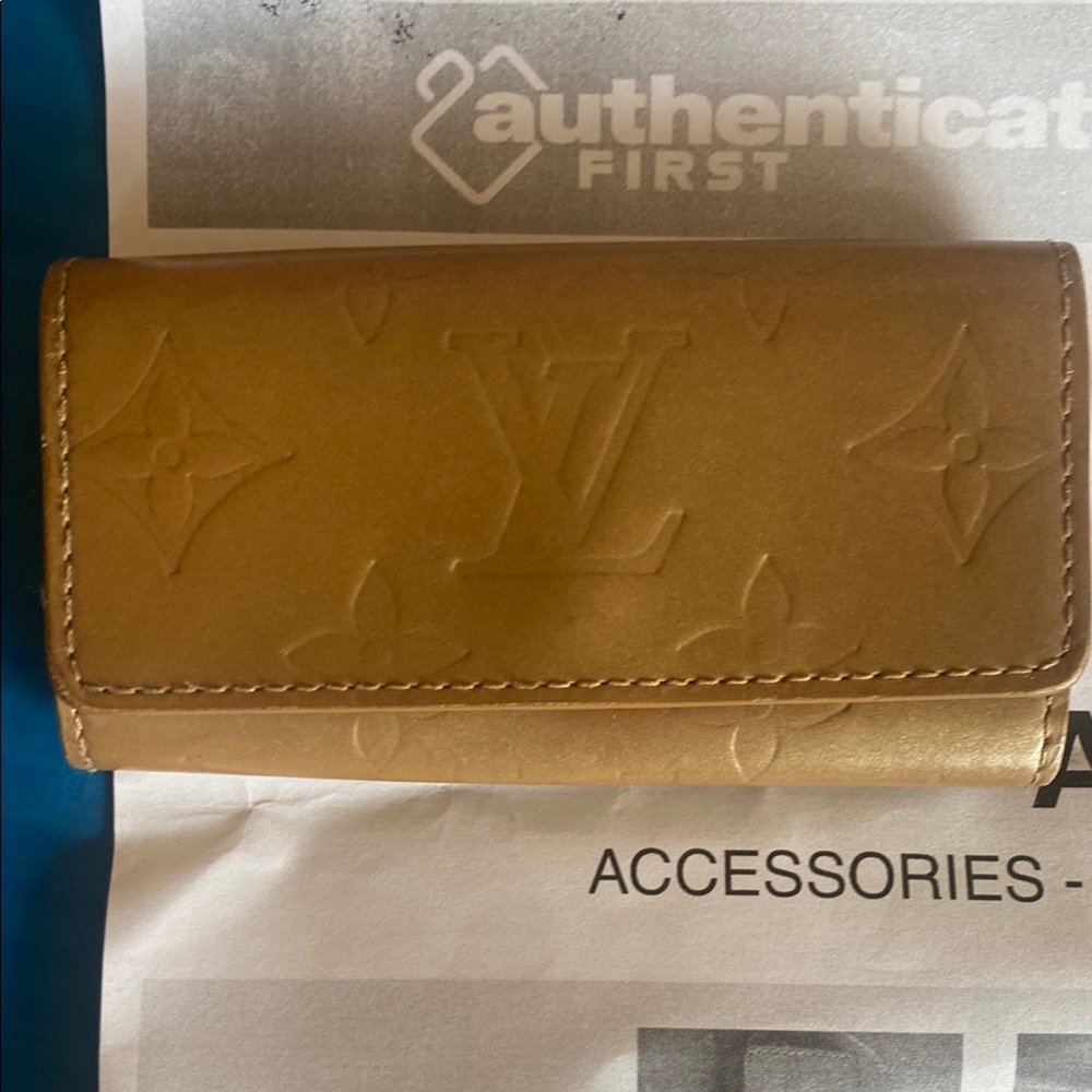 Louis Vuitton Tan Leather Key Holder with Monogram Embossing and Authentication